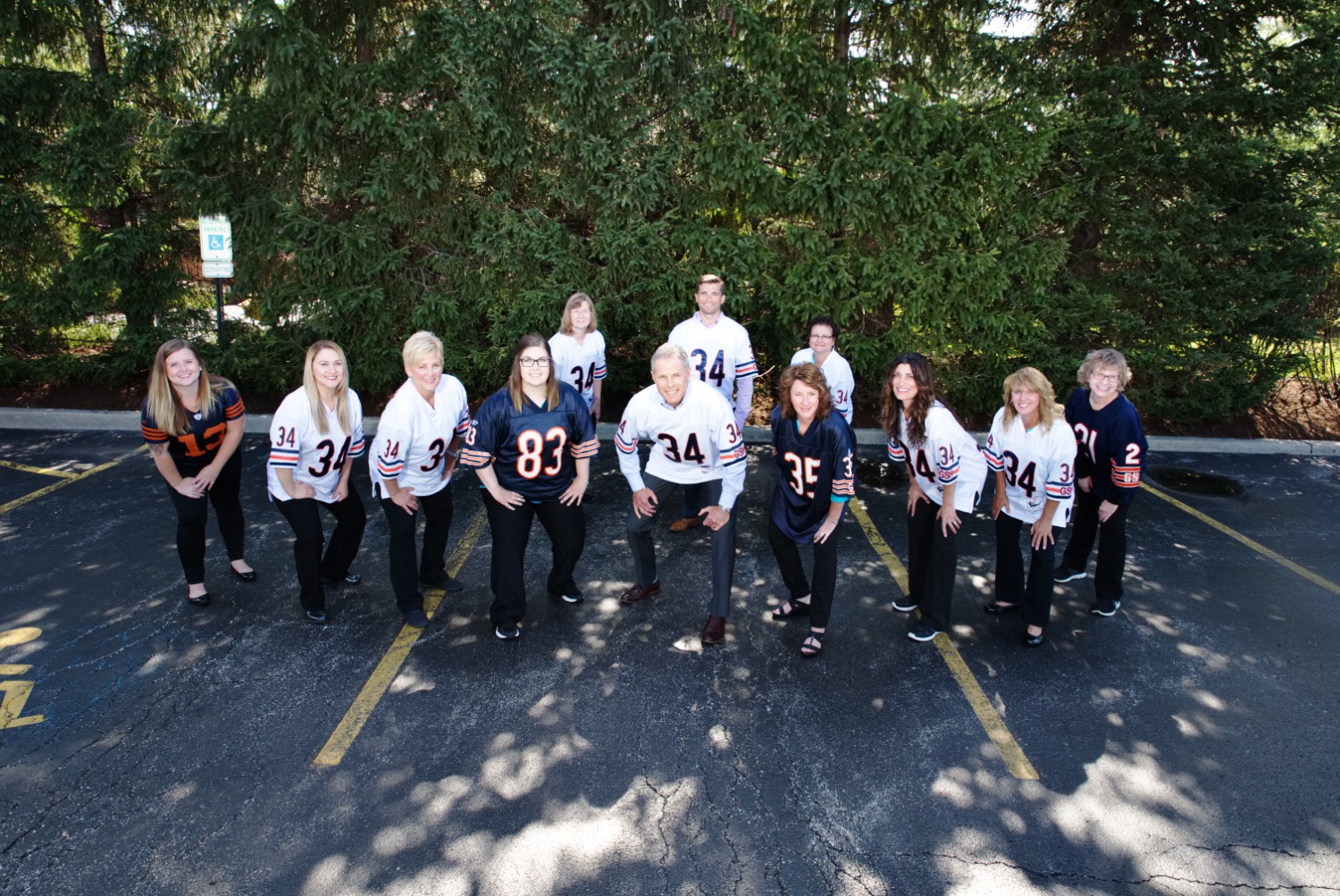 the booth orthodontics team wearing chicago bears jerseys