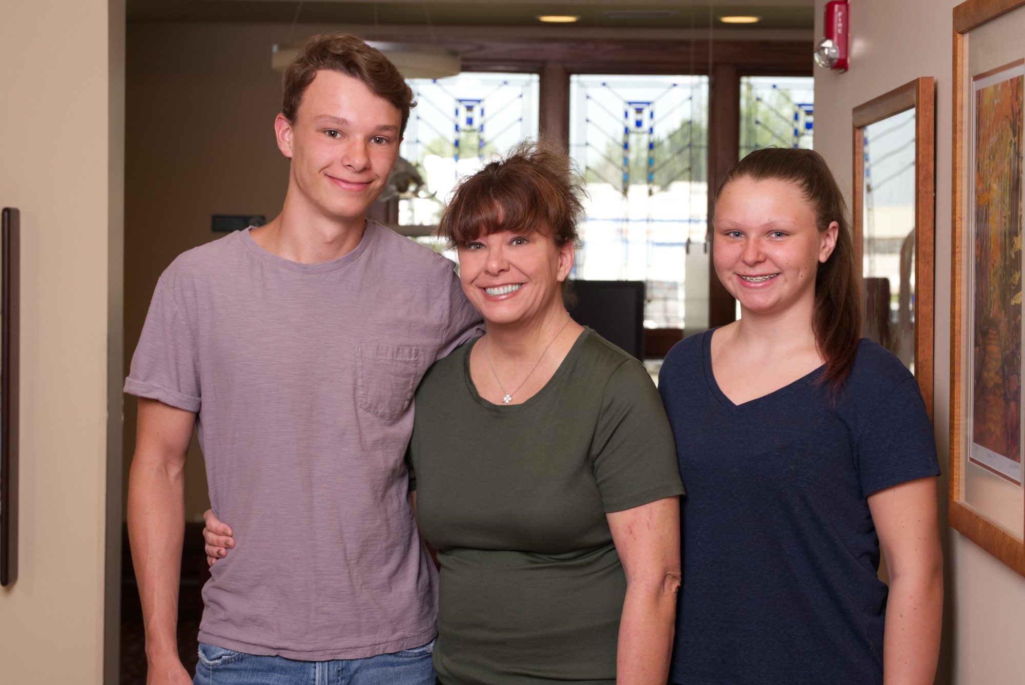 smiling family with straight teeth