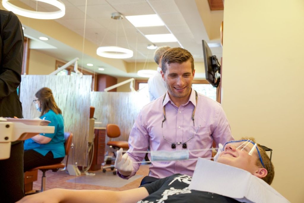 Dr. Booth with a braces patient