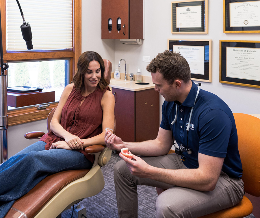 family smiling during orthodontic visit